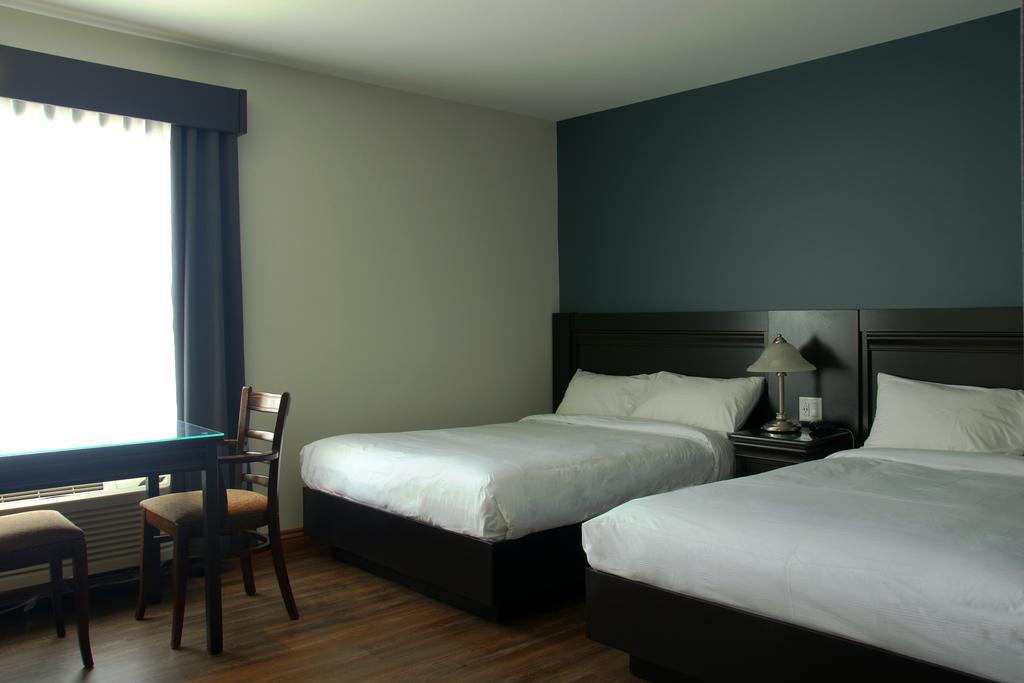 Hotel Le Montagnais แซเกอเนย์ ภายนอก รูปภาพ